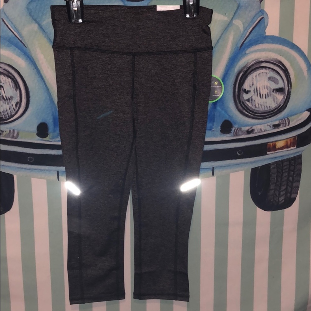 Never worn Size Small Xersion Fitted Mid Calf..